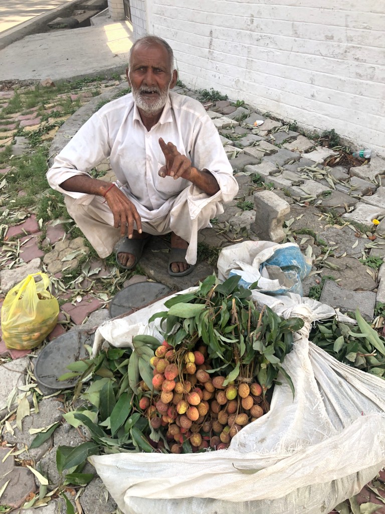 Happy face of a Litchi Vendor at Inder Road, Dalanwala, Dehradun