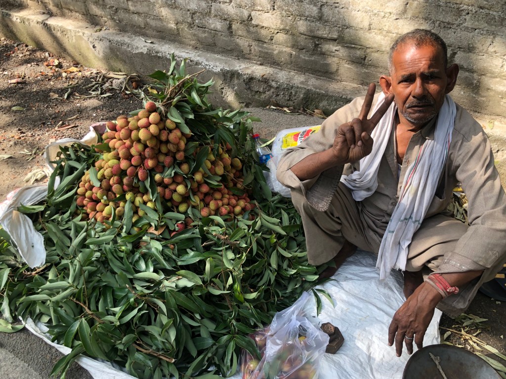 Happy face of a Litchi Vendor at Mohini Road, Dalanwala, Dehradun