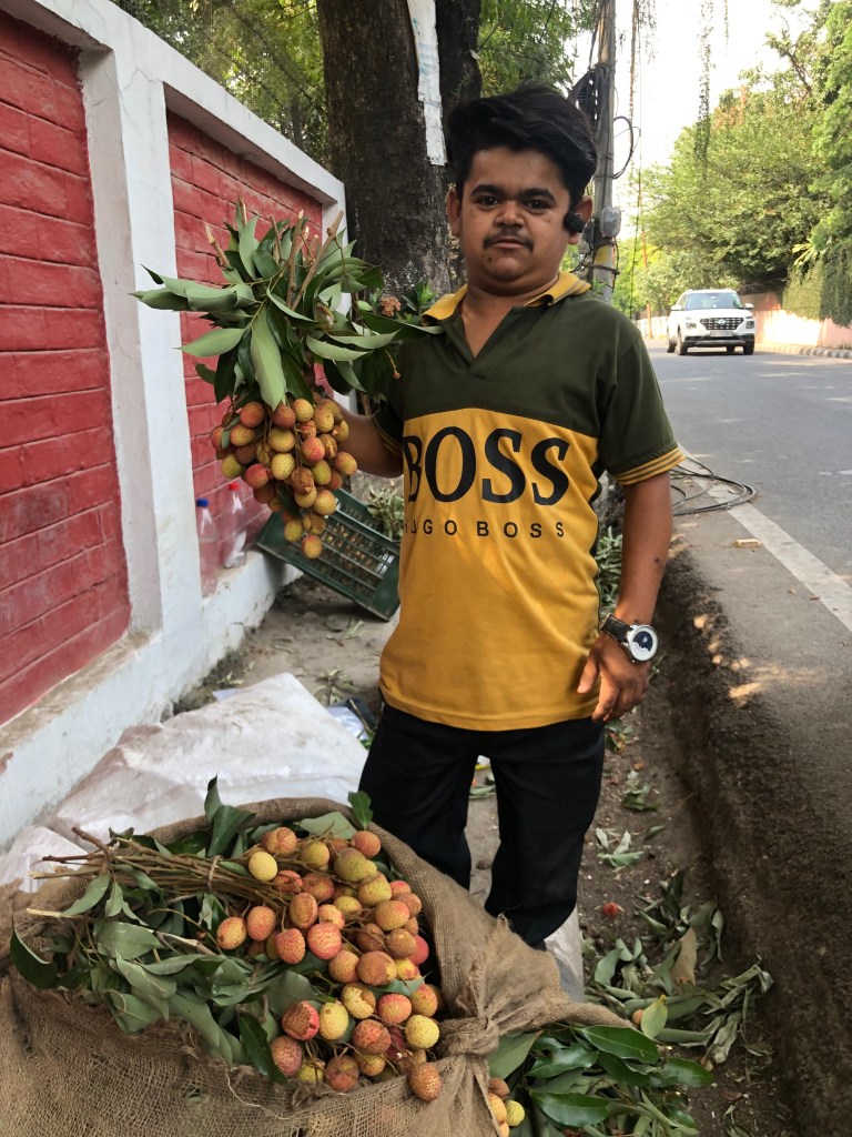 Happy face of a Litchi Vendor at Laxmi Road, Dalanwala, Dehradun