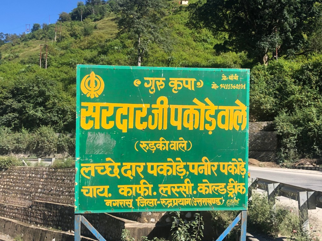 Signboard of Sardarji Pakode Waale, Nagrasu Town, District Rudraprayag, Uttarakhand.