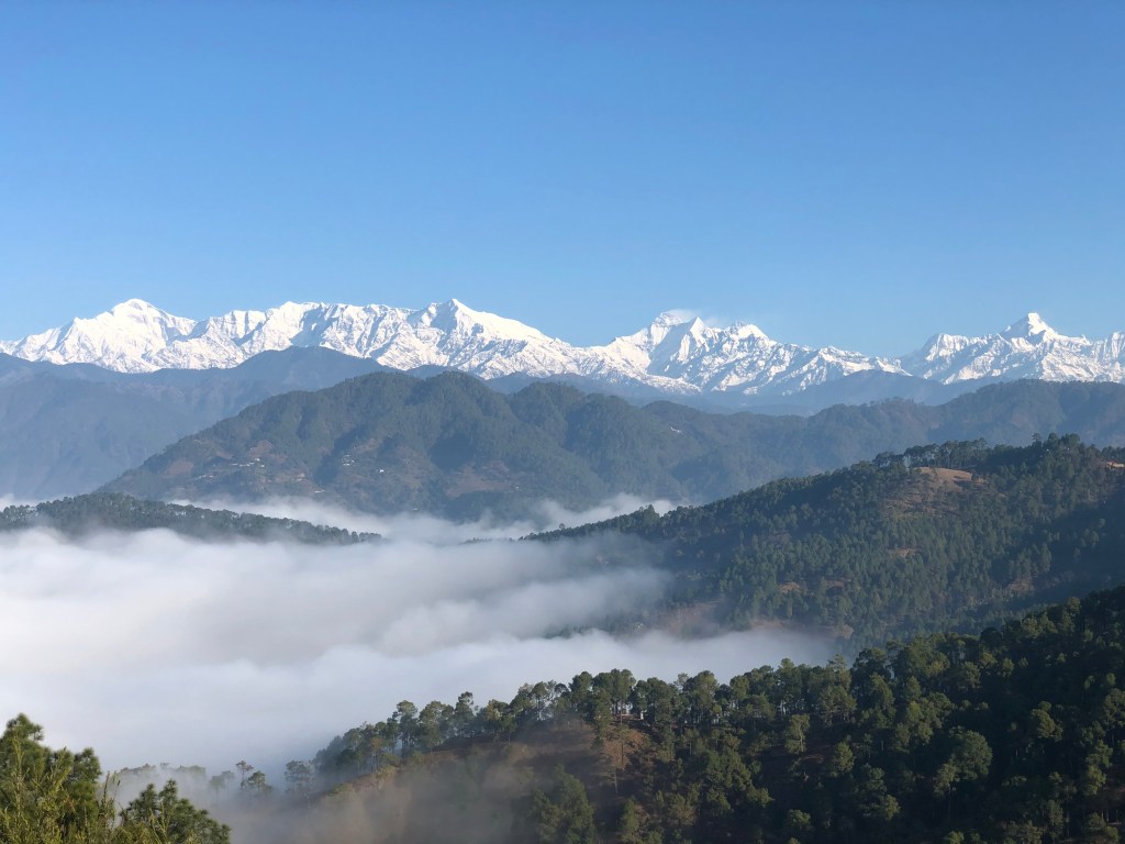 View of Trishul and other mighty peaks from Mankot village, near Bageshwar in the Kumaon region of Uttarakhand.
#devbhoomi #devbhoomiUttarakhand #himalayanviews #UttarakhandHimalayas #pahad #serene #snow #visitUttarakhand