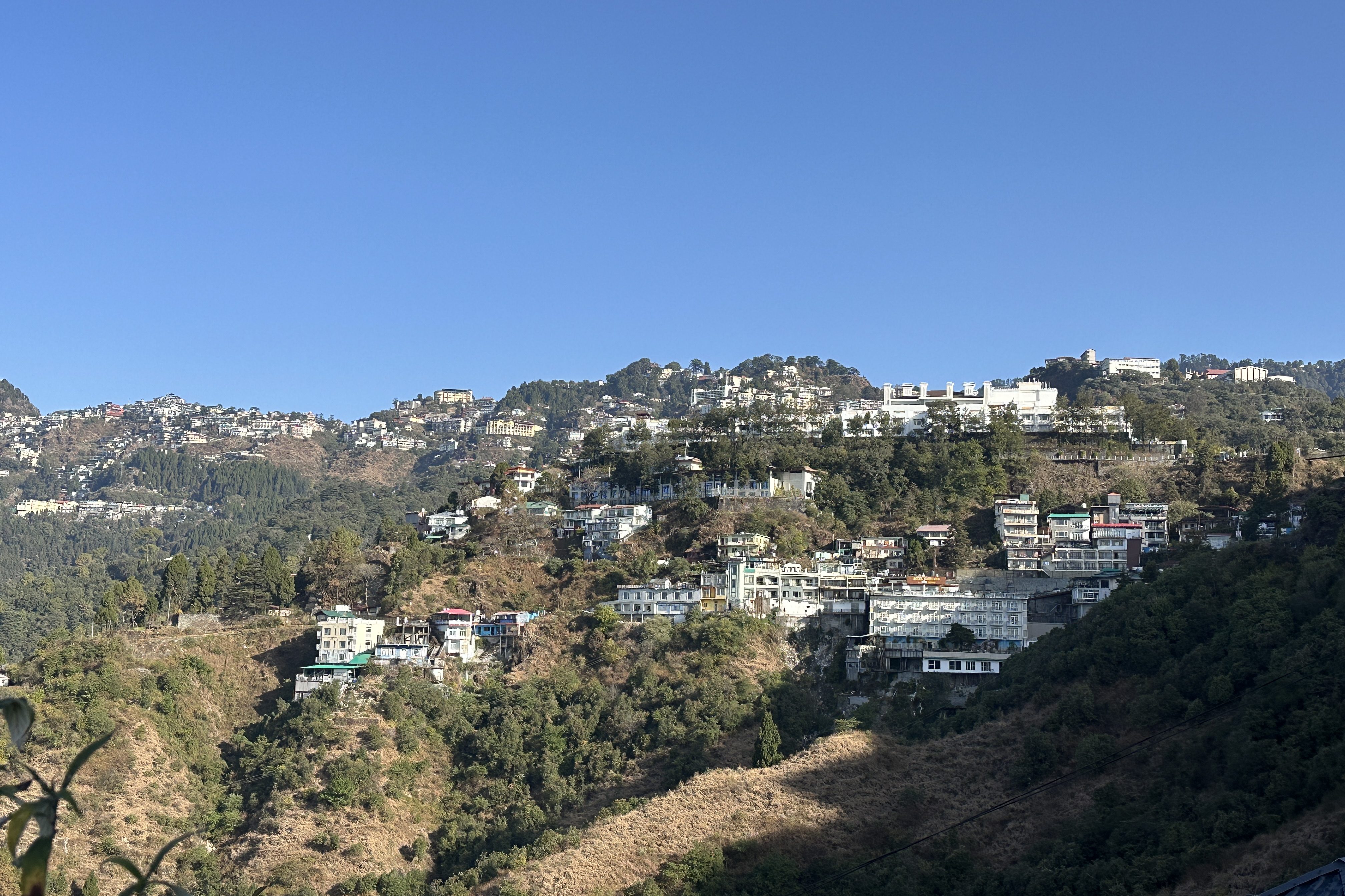 Barlowganj town in the frame. Mussoorie is a few kilometres ahead of this town. Barlowganj falls on the Rajpur - Mussoorie trail and is also connected by road. #mussoorie #dehradun #JPhotel #Uttarakhand #visitUttarakhand
